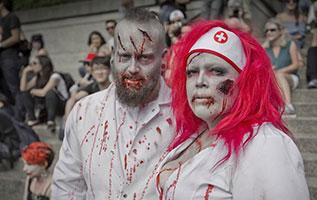two people dressed up to look like zombies
